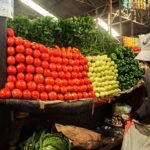 a_client_buy_vegetables_at_kimironko_market_._the_past_weeks_have_been_characterized_by_an_increase_in_commodity_prices_.craish_bahizi